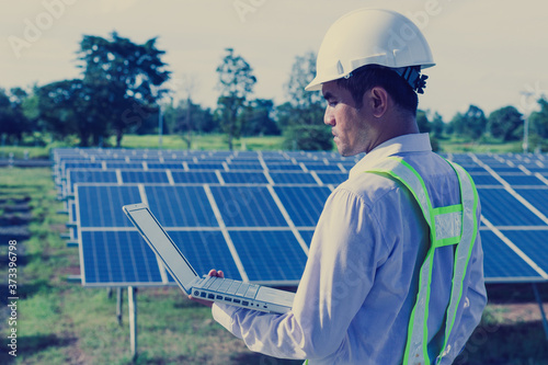 engineer or electrician working on maintenance equipment at industry solar power