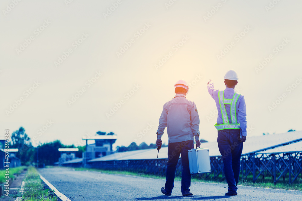 engineer or electrician working on maintenance equipment at industry solar power engineer or electrician working on maintenance equipment at industry solar power