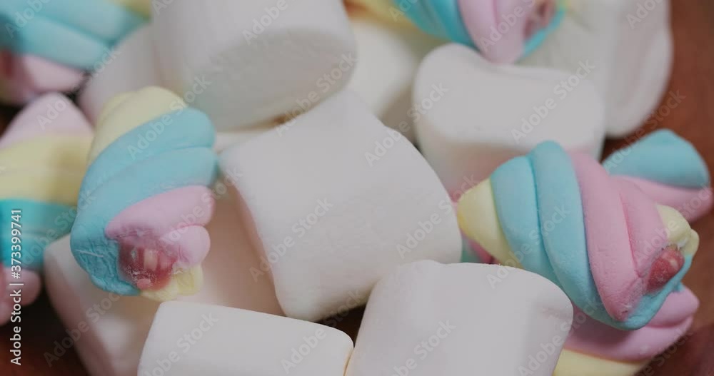 Sweet candy Marshmallow on wooden plate Sweet candy Marshmallow on wooden plate