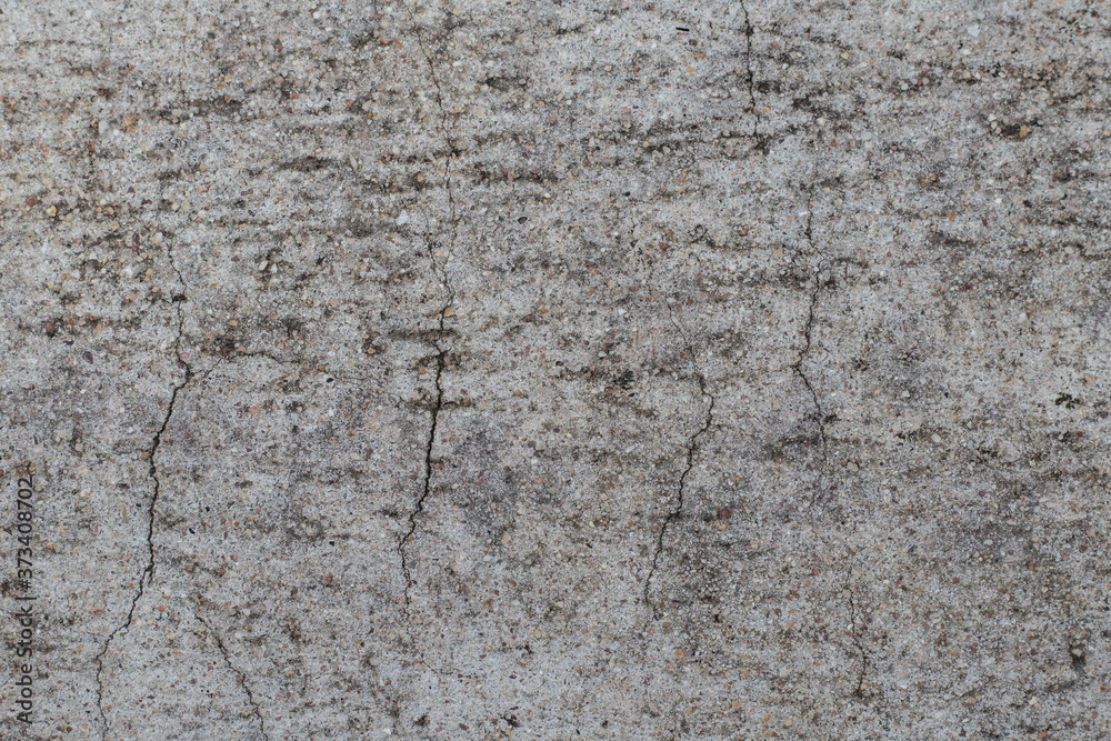 Cement surface walls have gray cracks. Cement surface walls have gray cracks.