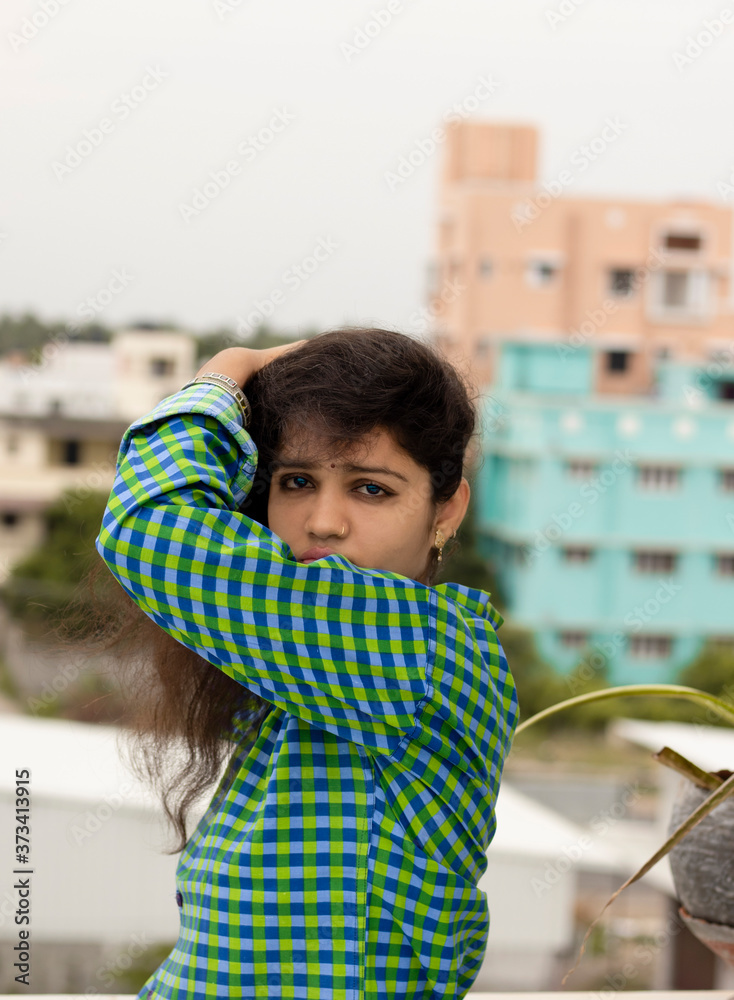 Sexy and romantic Indian girl with moist eyes and dressed in green shirt  and scattered and gorgeous red lips near hair face Stock Photo | Adobe Stock