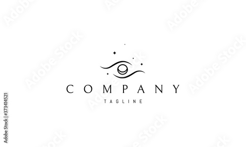 Vector logo on which an abstract image of an eye in space.