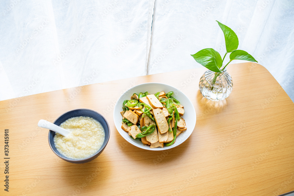 Chinese food millet porridge and green pepper sauteed dry Chinese food millet porridge and green pepper sauteed dry