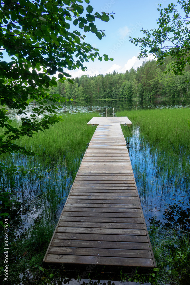 Scene at hiking trail in Nuuksio national park, Espoo, Finland. Scene at hiking trail in Nuuksio national park, Espoo, Finland.