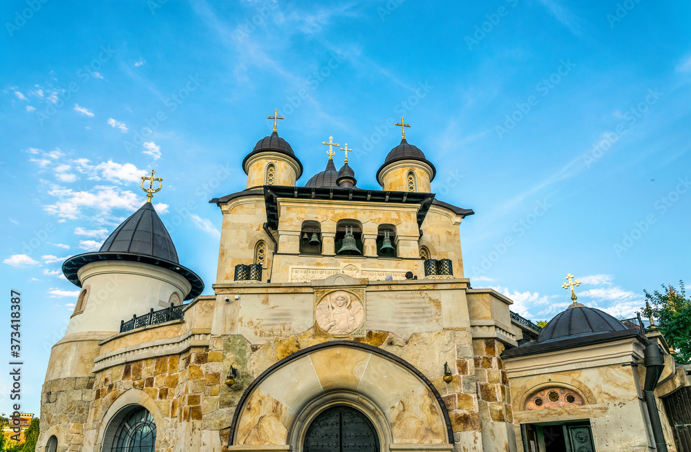 Facade and bell tower of the ancient Zvirinets monastery in Kiev, Ukraine