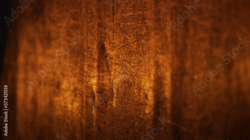 Fire is reflected in a sheet of metal in aluminium plant. Metal red and orange background. Red hot flames glowing and liquid melting.