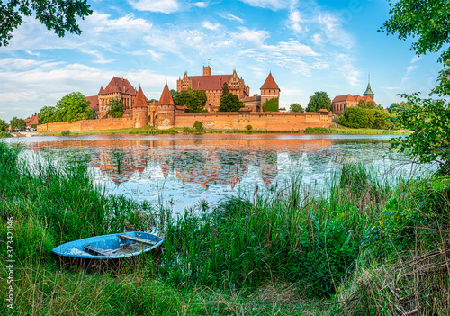 The Castle of the Teutonic Knights Order in Malbork, Poland, historical Prussia, is the largest castle in the world photo