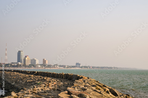 Landscape view of Calicut beach and Calicut city from a distance. © Vishnu
