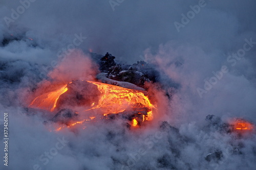 Lava flowing into the ocean from lava volcanic eruption on Big Island Hawaii, USA.