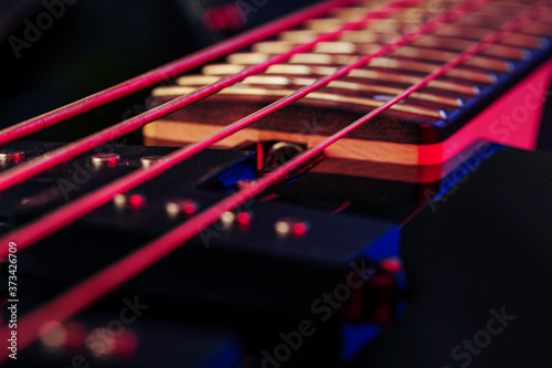 Guitar fingerboard with strings close up photo