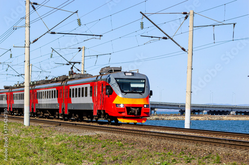 A passenger electric train leaves Vladivostok along the Trassiberian Railway.