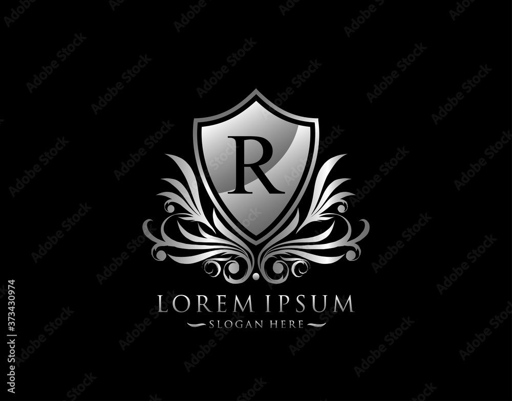 Luxury Shield R Letter Logo. Graceful Elegant Silver shield icon design. Luxury Shield R Letter Logo. Graceful Elegant Silver shield icon design.