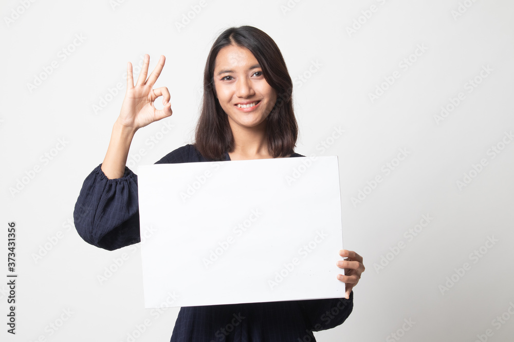 Young Asian woman show OK with white blank sign. Young Asian woman show OK with white blank sign.