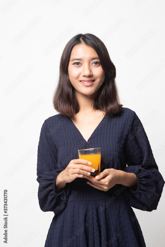 Young Asian woman drink orange juice. Young Asian woman drink orange juice.