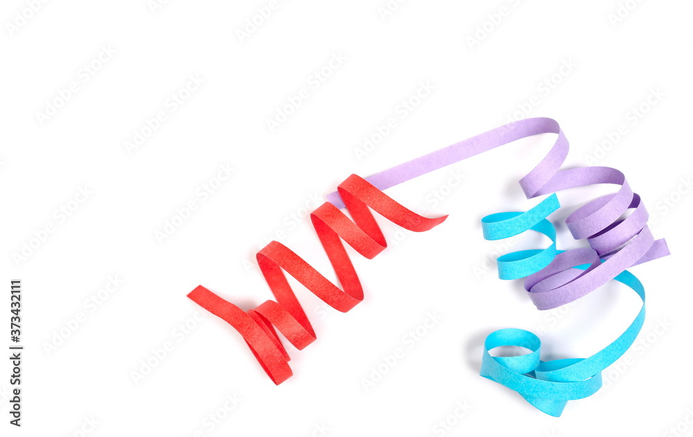 Colorful paper curls, strips, ribbons isolated on white background and texture, top view Colorful paper curls, strips, ribbons isolated on white background and texture, top view