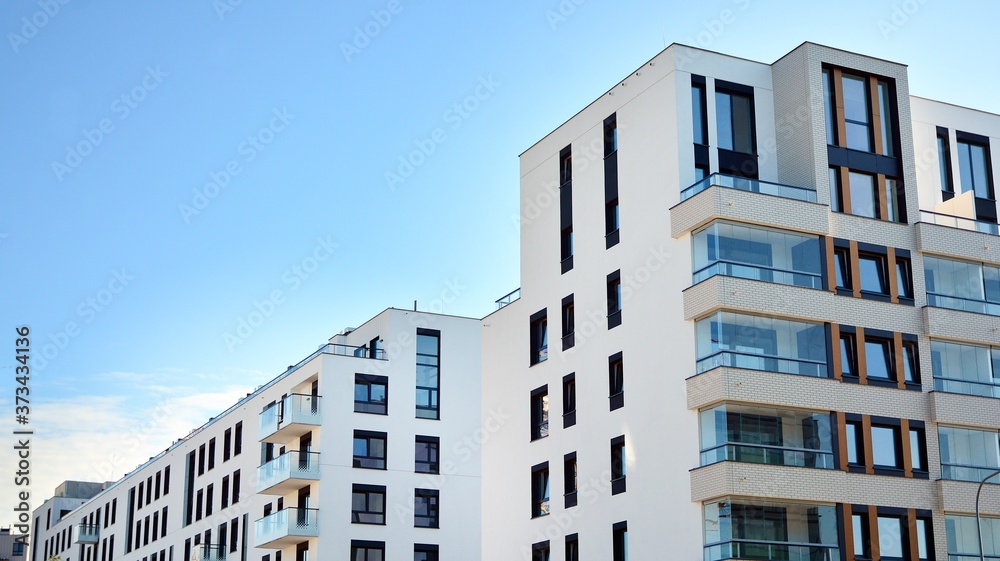 Fototapeta premium Architectural details of modern apartment building. Modern european residential apartment building complex.