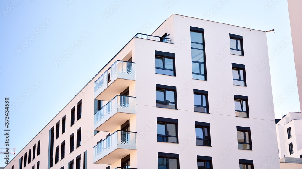 Architectural details of modern apartment building. Modern european residential apartment building complex.