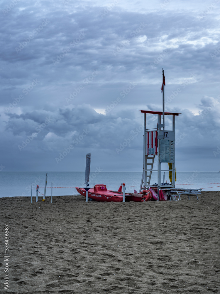 Beach landscape with tower for rescue personnel Beach landscape with tower for rescue personnel