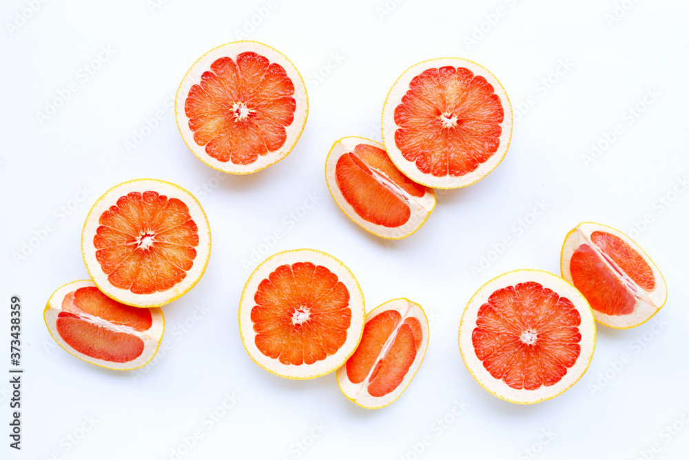 High vitamin C. Juicy grapefruit on white. High vitamin C. Juicy grapefruit on white.