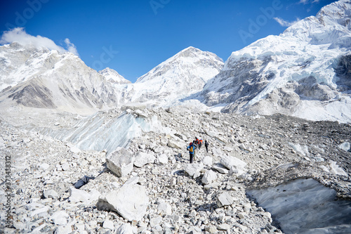 khumbu glacier snow covered mountains with blue sky