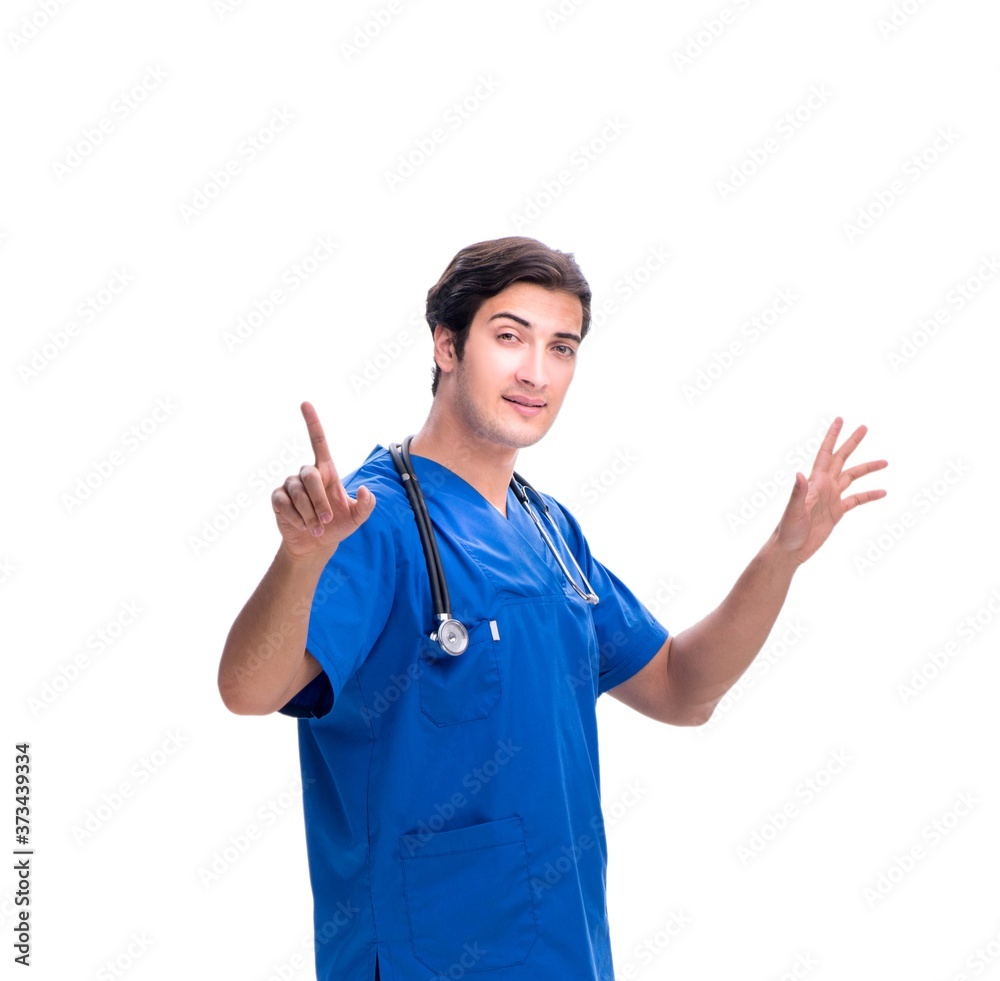 Young male doctor pressing buttons isolated on white Young male doctor pressing buttons isolated on white