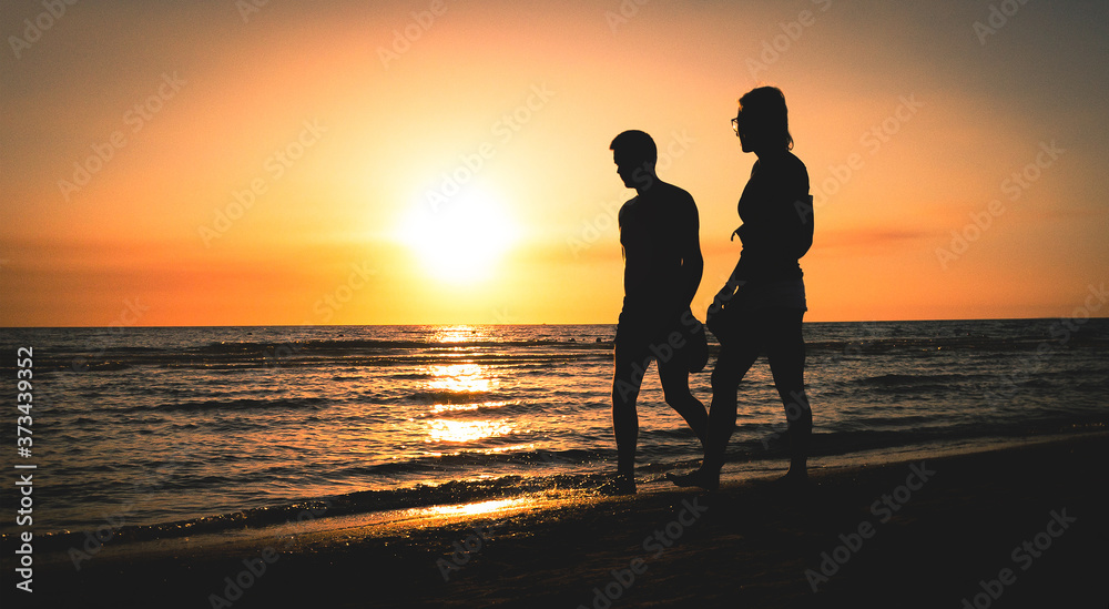 couple at the sunset beach