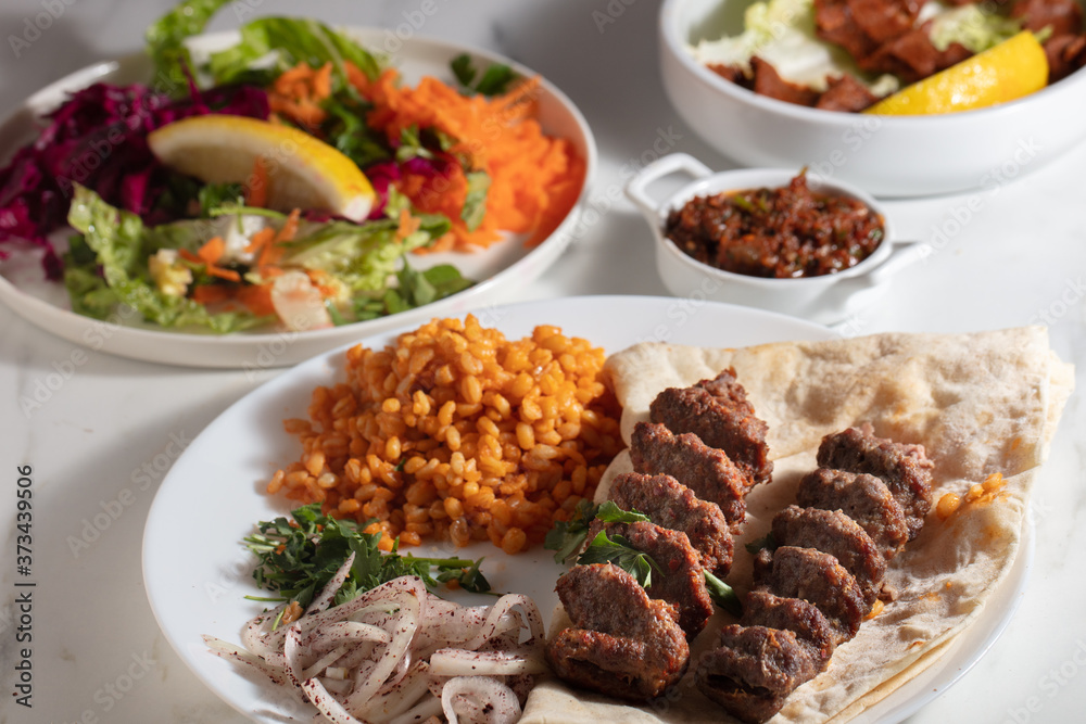 Turkish Adana Kebab with Vegetables on the Plate