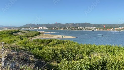 Wallpaper Mural SLOW MOTION SHOT - People practicing kitesurf. Kitesurfers on the mouth of the Cavado River in Esposende, Portugal. Esposende it's renowned by kite-surfers as one of the best places to kitesurf. Torontodigital.ca