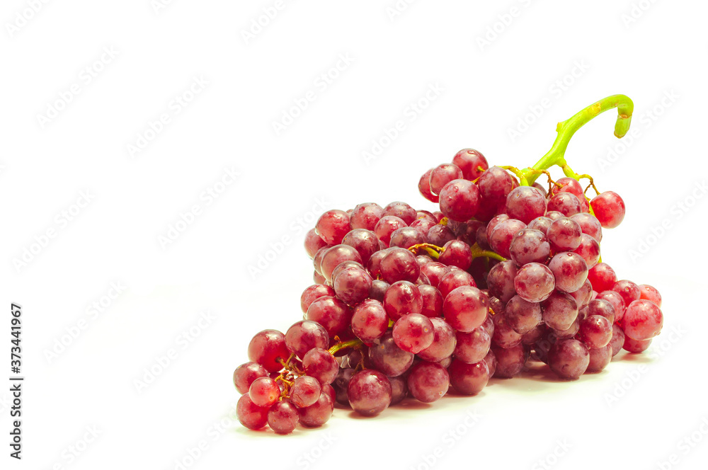 Seedless red grapes isolate on white background. Seedless red grapes isolate on white background.