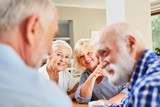 Two senior men talking in the retirement home