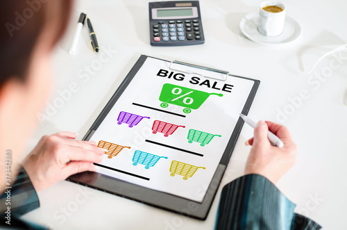 Big sale concept on a clipboard