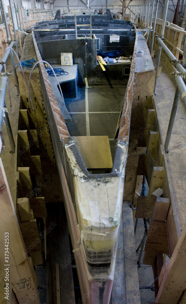Fiberglass hull. Shipbuilding industry. Working with fiberglass