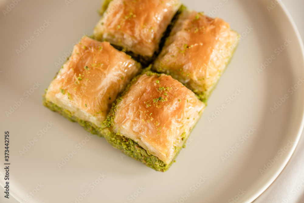 walnut, pistachio turkish style antep baklava presentation and service walnut, pistachio turkish style antep baklava presentation and service