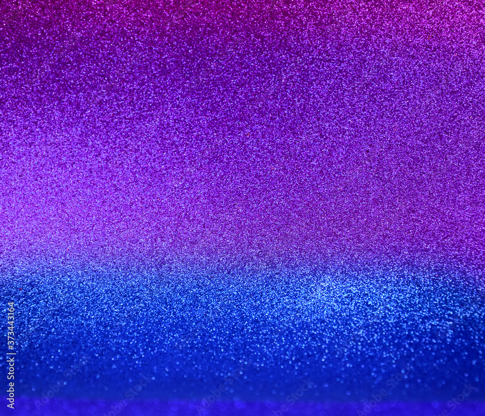 Shiny blue and purple glitter texture background stock images. Texture of blue purple glitter shiny background. Abstract blue pink shiny background with copy space for text