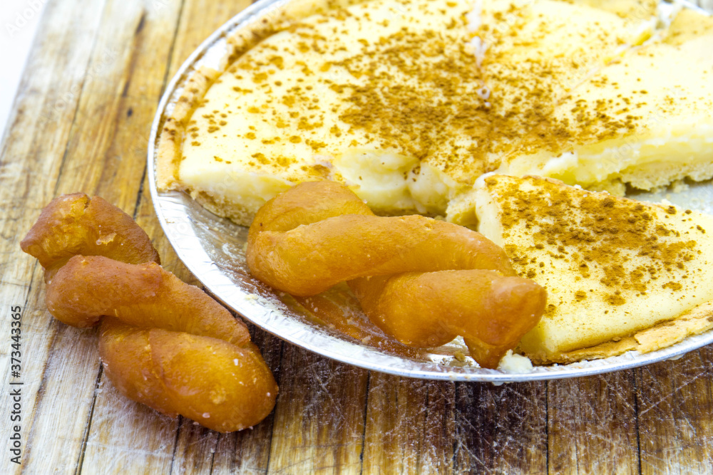Foto de Melktert milk tart and koeksisters are traditional Afrikaner ...
