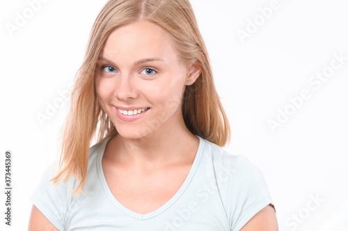 Pretty smiling joyfully female with blonde hair