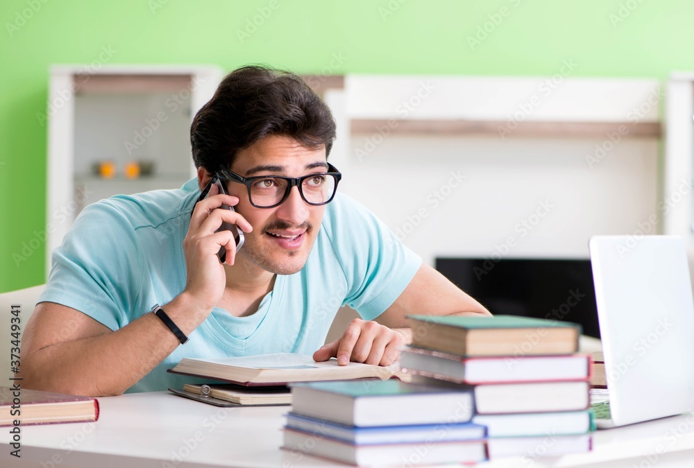 Student preparing for university exams at home Student preparing for university exams at home