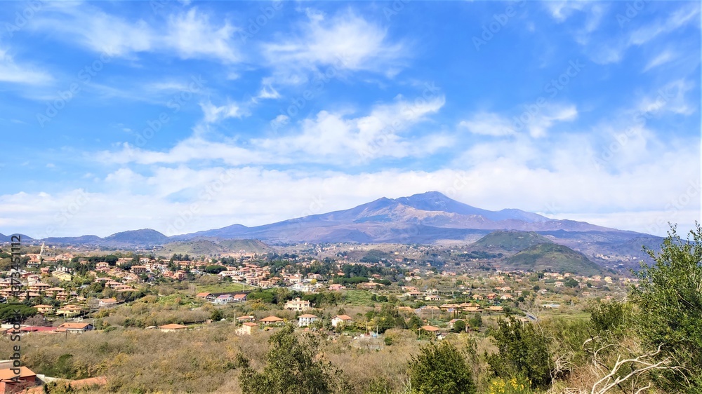 March 5, 2019 Etna volcano calm on a sunny day, 
against a cloudy sky