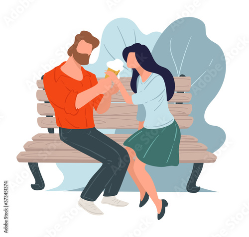 Couple on date eating ice cream sitting on bench