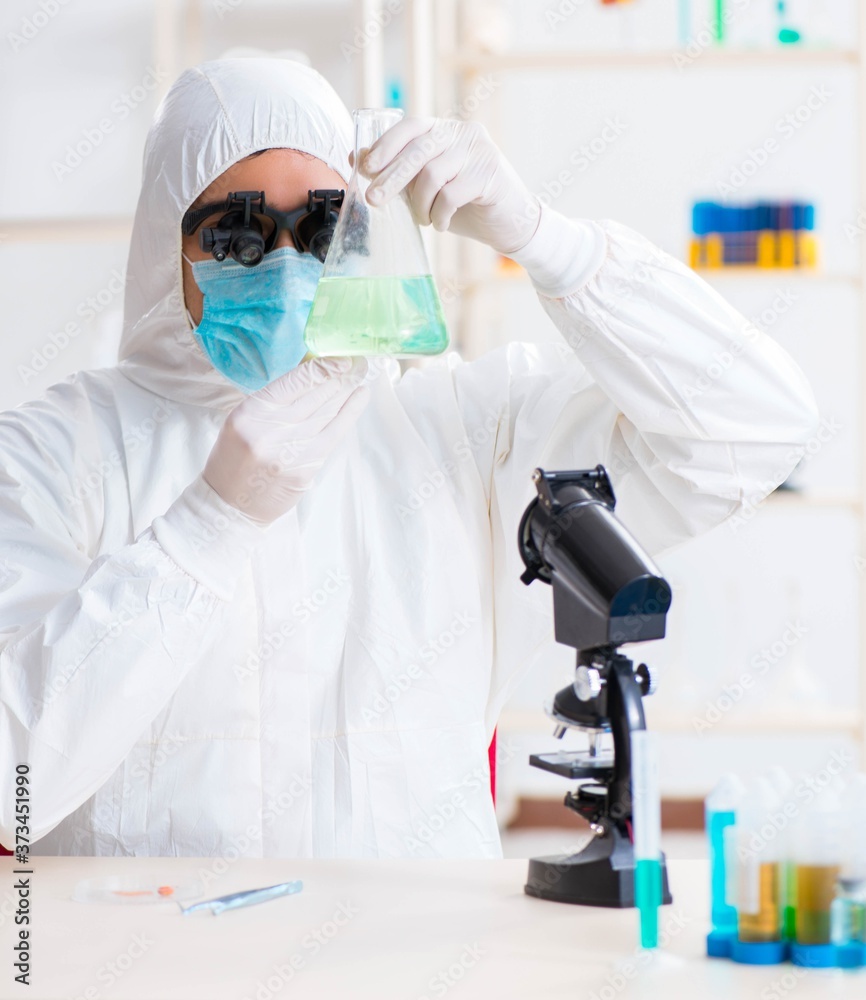 Young chemical scientist working in lab Young chemical scientist working in lab