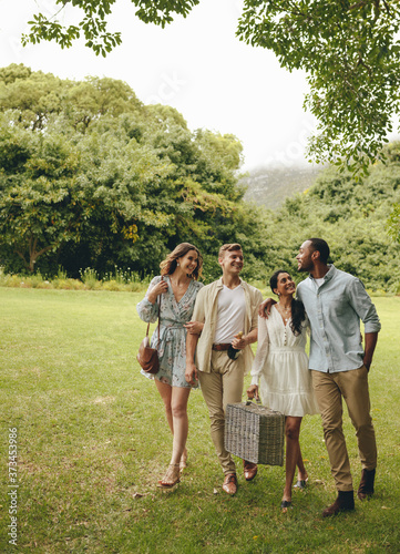 Friends walking together in the park