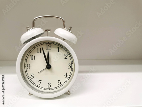 Vintage alarm clock in a room
