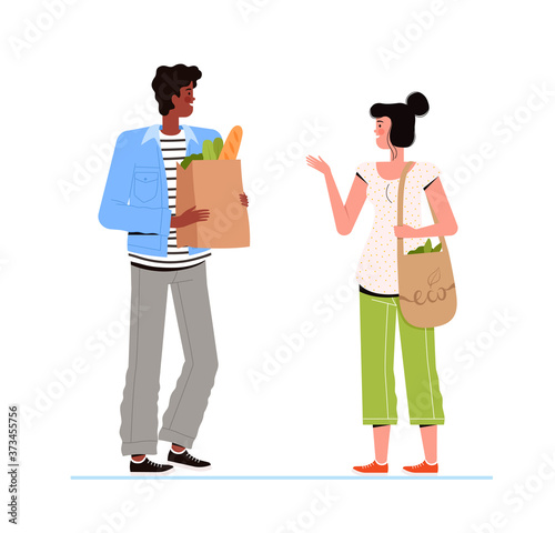A man with a package of products and a woman with an eco bag are talking. The concept of avoiding plastic bags. A short friendly conversation.