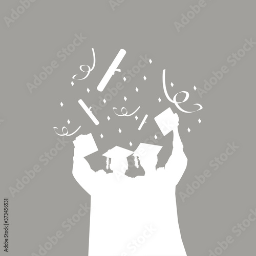 Young graduated students celebrate their success. Graduation concept.
