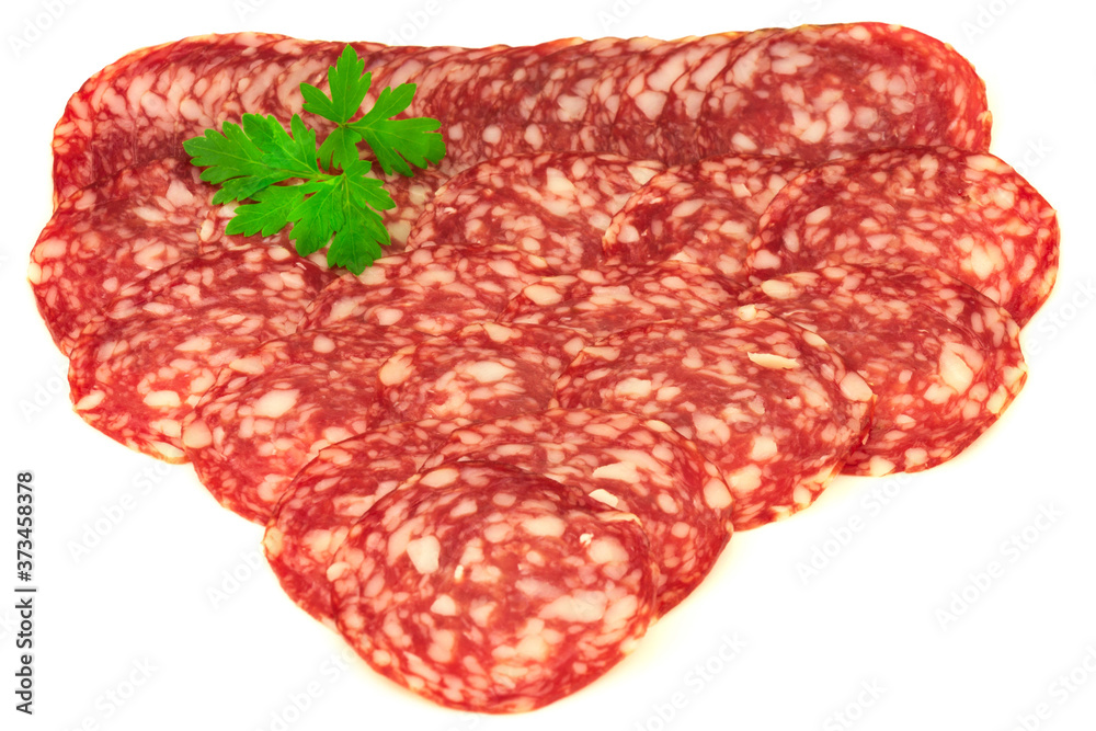 Group of thin slices of french dry salami and parsley isolated on white background Group of thin slices of french dry salami and parsley isolated on white background