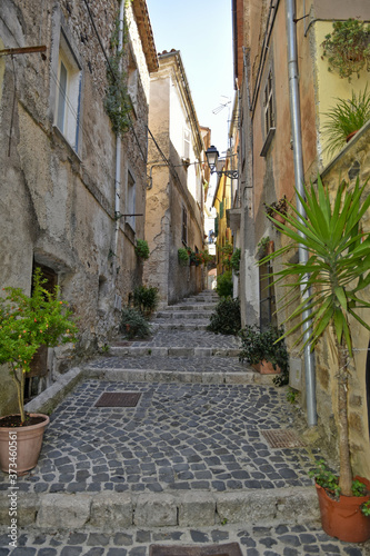 A small street between the old houses of Giuliano di Roma  of a medieval village in the Lazio region  Italy. 