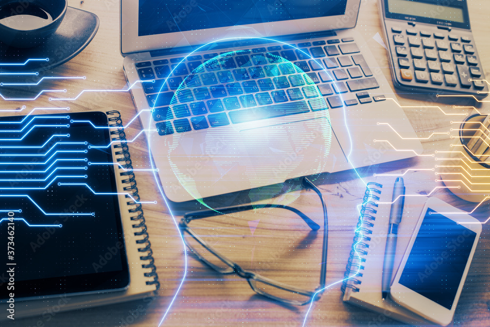 Double exposure of desktop with computer and brain drawing hologram. Artificial intelligence concept. Double exposure of desktop with computer and brain drawing hologram. Artificial intelligence concept.