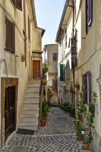A small street between the old houses of Giuliano di Roma, of a medieval village in the Lazio region, Italy. © Giambattista