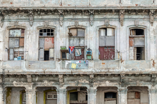 Old facade in Havana with windows and arches