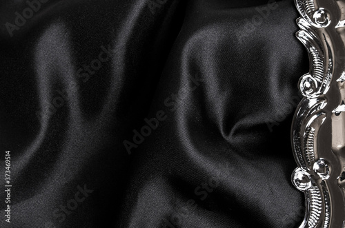 luxury black wavy silk texture with silver frame abstract background